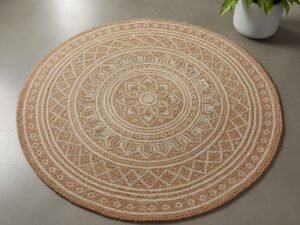 Round natural jute rug with a central medallion design.