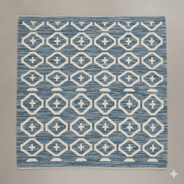 Shatranji rug with an intricate, mosaic-like tiled pattern in cool blue and grey tones.