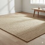 A timeless and versatile area rug in natural beige with a rich, chunky basketweave texture.