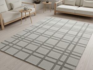 A subtle, minimalist grey rug with a tone-on-tone geometric pattern.